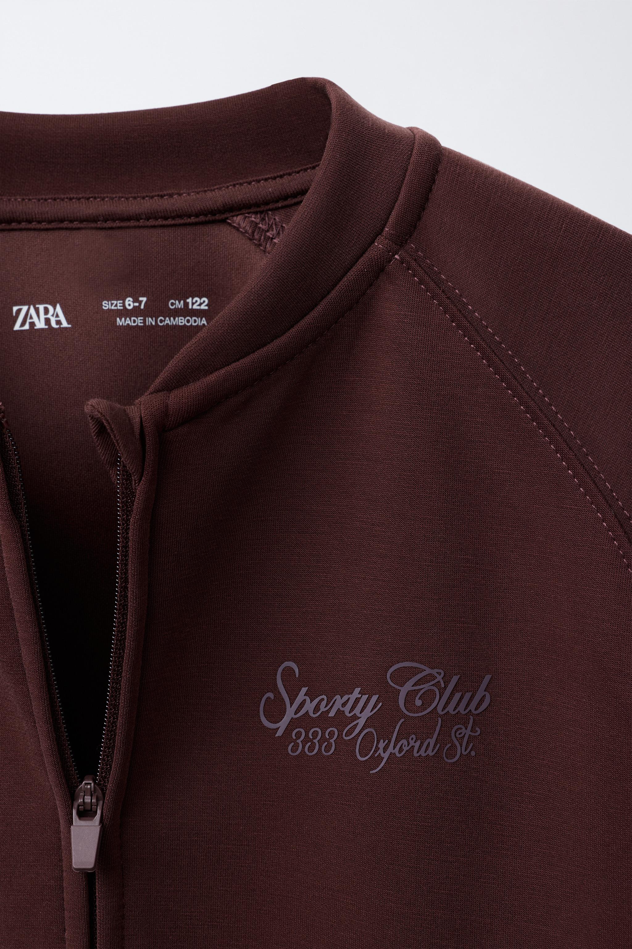 SPORTY JACKET WITH RAISED TEXT